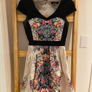 Luxe Black Bodice Floral Fit-and-Flare Dress with Cream Skirt